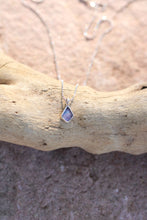 Load image into Gallery viewer, Necklace with a purple pendant on a piece of driftwood