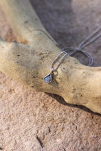 Load image into Gallery viewer, Silver necklace with a opal pendant on a piece of driftwood.