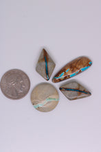 Load image into Gallery viewer, Four turquoise stones on a white background, one next to a quarter for size comparison.
