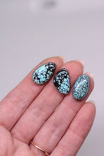 Load image into Gallery viewer, Hand with turquoise on a plain background
