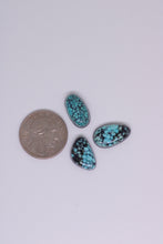 Load image into Gallery viewer, Three turquoise stones next to a quarter on a white background
