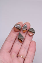 Load image into Gallery viewer, Hand with jasper stones on a plain background
