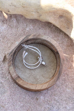 Load image into Gallery viewer, silver hoop earrings with heart shaped opal charms inside a wooden box
