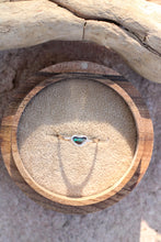 Load image into Gallery viewer, Ring with a green heart opal gemstone in a wooden box on a stone surface
