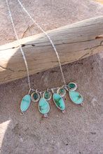 Load image into Gallery viewer, Necklaces with variscite and kyanite stones on a stone surface

